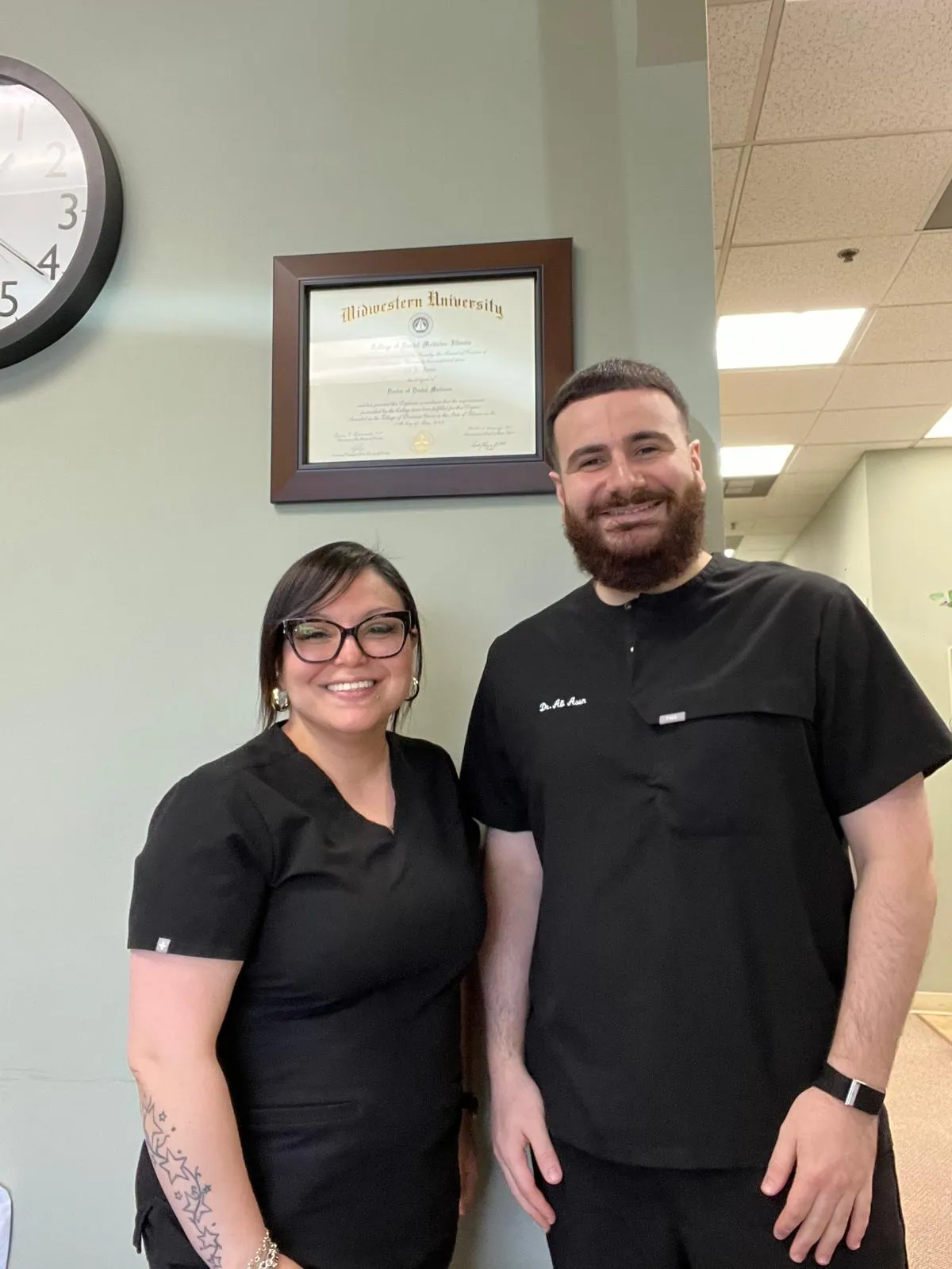 Urban Dental Care dentist and team member inside the Woodridge dental office
